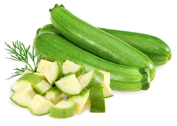 fresh green zucchini or marrow with slices and green leaves isolated on white background.  clipping path