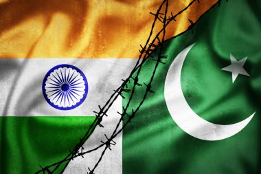 Hindistan ve Pakistan 'ın Grunge bayrakları dikenli tel çizimine bölündü, Hindistan ve Pakistan arasındaki gerilim ilişkileri kavramı 