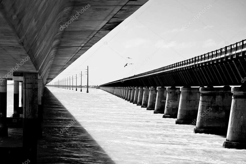 Seven Mile Bridges old and new in Marathon black and white view, U. S. Route 1 in Florida Keys, south Florida, United States of America