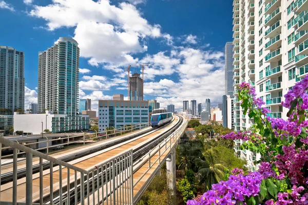 Miami downtown skyline and futuristic mover train colorful view, Florida state, United States of America