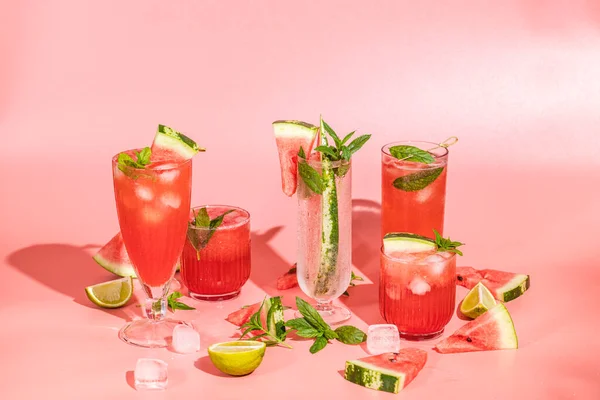 Different Elegant Glasses Watermelon Cocktail Splash Splatter Water Drops Pink — Fotografia de Stock