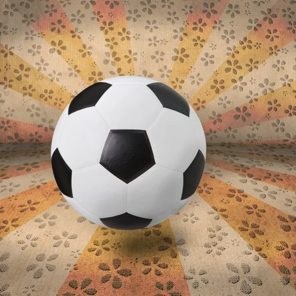Fútbol fútbol sobre fondo de rayo colorido — Foto de Stock