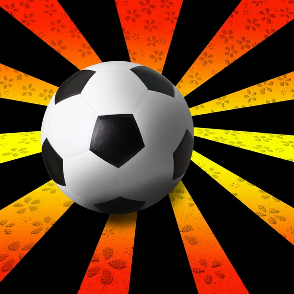 Fútbol fútbol sobre fondo de rayo colorido — Foto de Stock