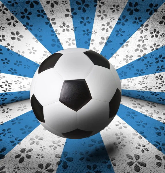Soccer football on colorful ray background — Stock Photo, Image