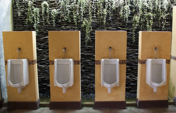 Row of urinals — Stock Photo, Image