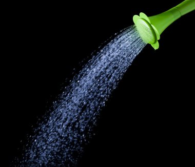 Yeşil sulama olabilir yüksek hızlı çekim hızı ile su dökme izole