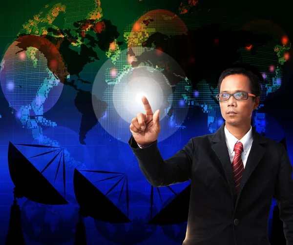 Business man pointing to world map with telecommunication backgr — Stock Photo, Image