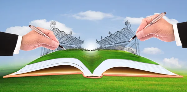 Hand schrijven stadion op groen gras gebruik voor bouw en gezonde thema — Stockfoto