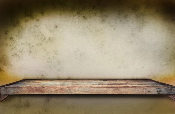 Old wood shelf on grungy wall — Stock Photo, Image