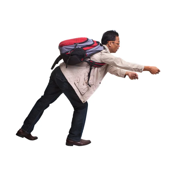 Backpacker in acting on white background — Stock Photo, Image