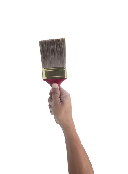 Hand som håller målning borste — Stockfoto