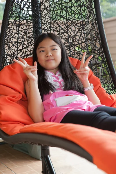 Girl relaxing emotion on hanging bed at home terrace — Stock fotografie