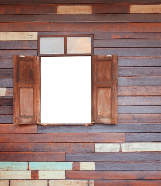 Oude houten venster op houten muur van huis grens — Stockfoto