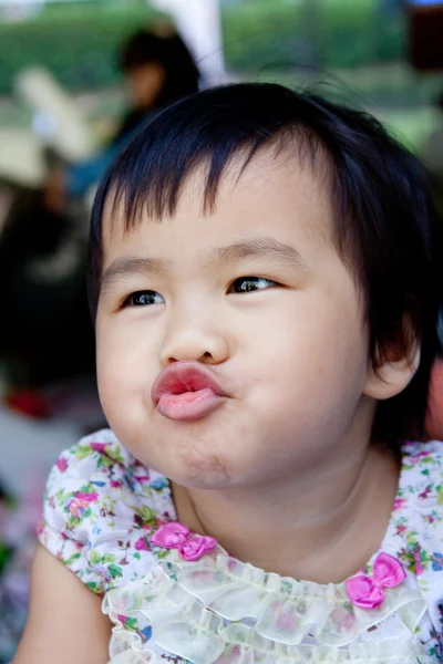 Close up face of lovely and cute asian baby making funny mouth — Stock Photo, Image