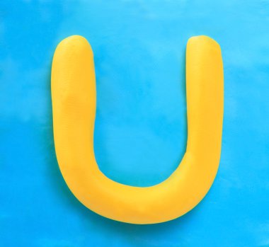 Sarı kil Alfabe harf u