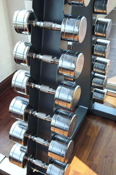 Sports weight dumbbells set in healthy care fitness room use — Stock Photo, Image