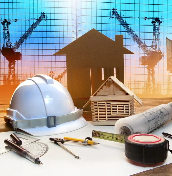Office tower and home construction plan on architect working tab — Stock Photo, Image