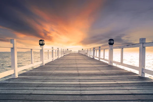 Old wood bridg pier with nobody against beautiful dusky sky use Royalty Free Stock Images