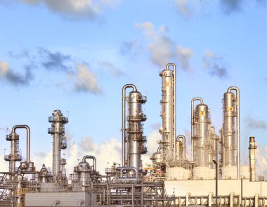 refinery petrochemical plant in heavy industry estate clipart