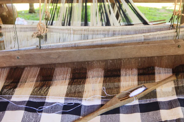 Weaving shuttle on thai tradition clothes weaving — Stock Photo, Image