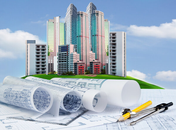 plan of building construction on engineer working table against 