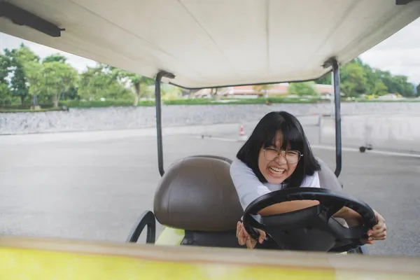 Asian Teenager Funny Driving Golf Car — Stock Photo, Image