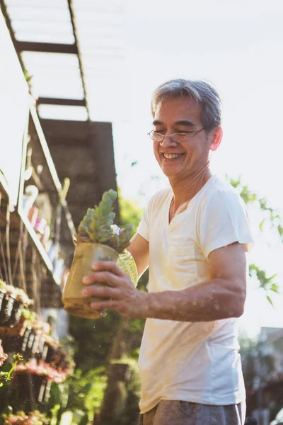 Asian Man Holding Plant Pot Toothy Smiling Happiness Face — Stok fotoğraf
