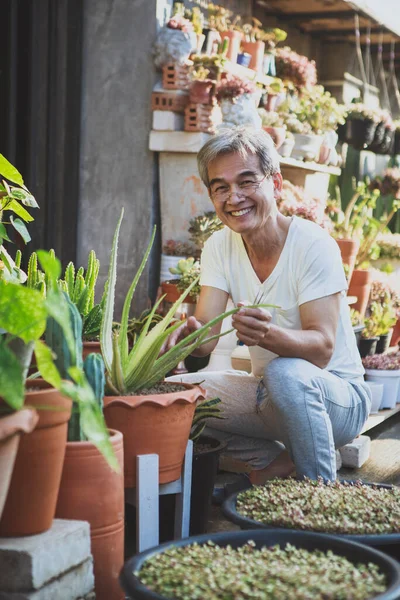 Asian Senior Man Smiling Happiness Face Sitting Home Garden — Zdjęcie stockowe