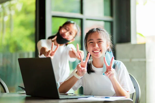 Two Asian Teenager Toothy Smiling Happiness Face While Take Out — Stock fotografie