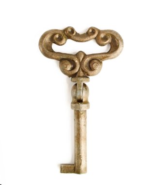 Old metallic key or brass isolated on the white background.