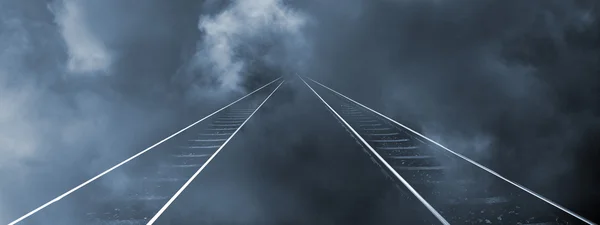 Railroad-tracks leading into horizon — Stock Photo, Image
