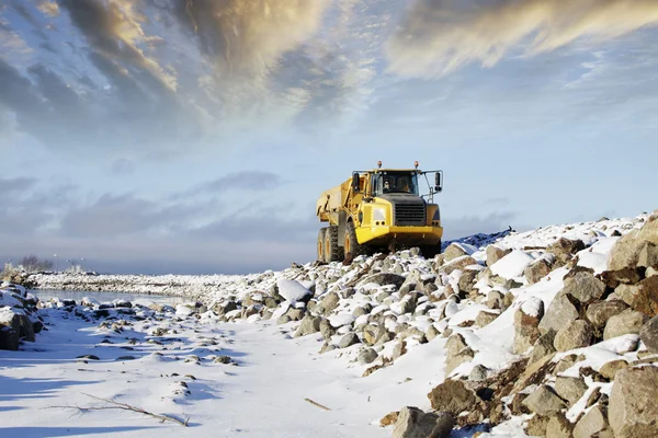 Heavy truck driving in rough terrain — Stock Photo, Image