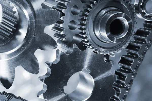 Gears and cogwheels, titanium and steel — Stock Photo, Image