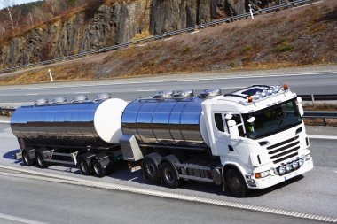 Fuel truck on the move clipart