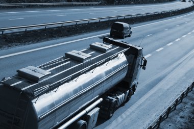 Fuel-truck driving on a dual lane freeway