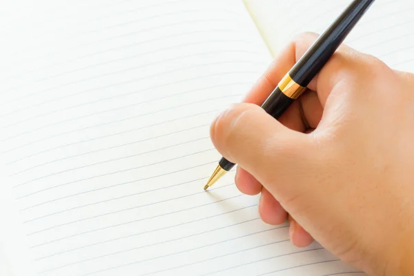 Close up of male hand signing — Stock Photo, Image