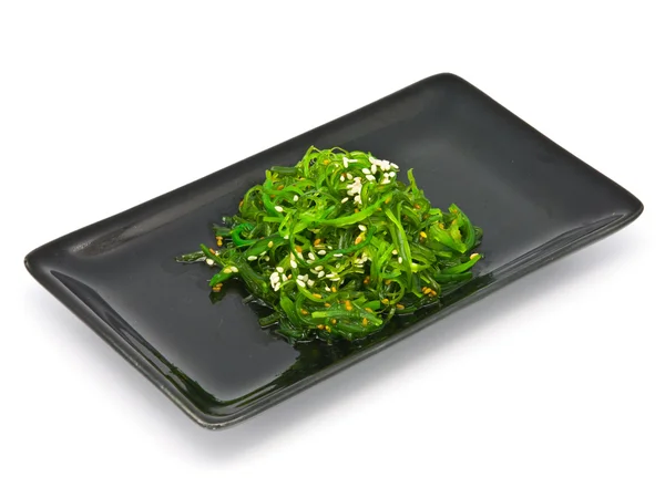 Japanese Cuisine , Seaweed Salad in black plate — Stock Photo, Image