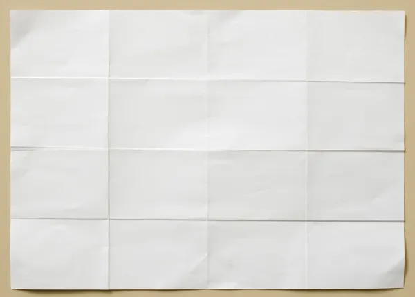 Fehér texturált papírlapot összehajtva, tizenhat részben — Stock Fotó