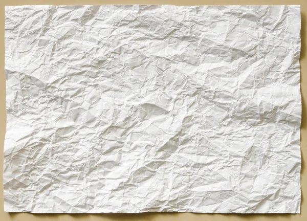 White textured sheet of paper crumpled — Stock Photo, Image