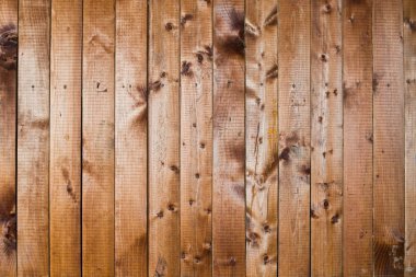 Doğal desenli kahverengi ahşap doku.