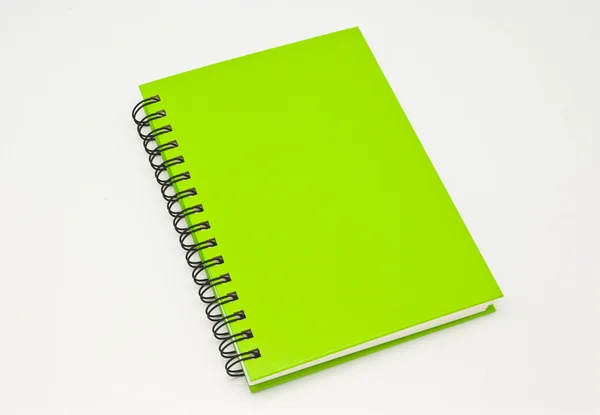 Zásobník kroužkových pořadačů knihu nebo zelená notebook — Stock fotografie