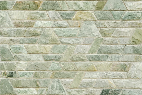 Pattern of green slate stone wall surface — Stock Photo, Image