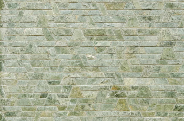 Muster der grünen Schiefersteinmauer — Stockfoto