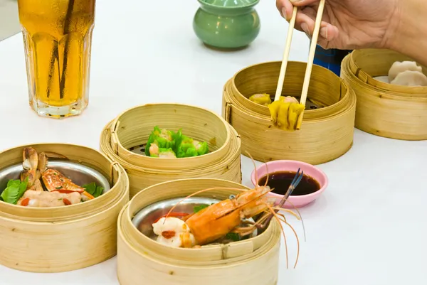 Assorted Dim Sum with chopsticks