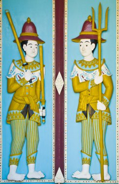 trä snidade färg i templet dörr