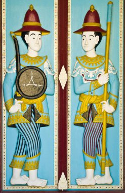 trä snidade färg i templet dörr