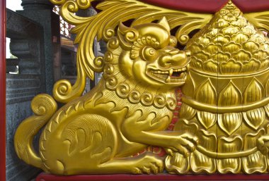 Aslan ahşap oymacılık altın boya