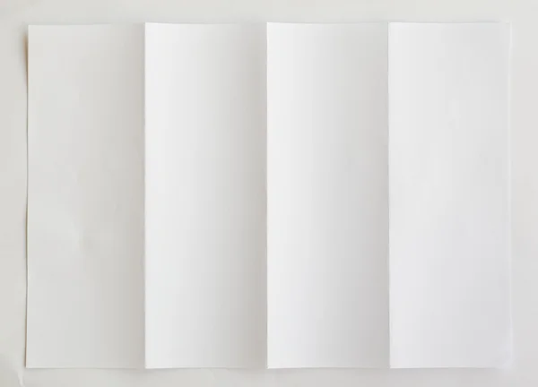 Folha de papel branca texturizada dobrada — Fotografia de Stock