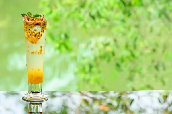 Close Delicious Juicy Fresh Passion Fruit Glass Table Blurred Leaf — Stock Photo, Image