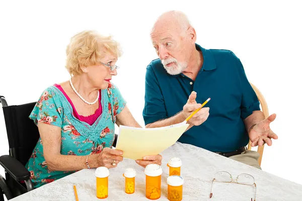 Senior Couple Discussing Medical Expenses — Stock Photo, Image